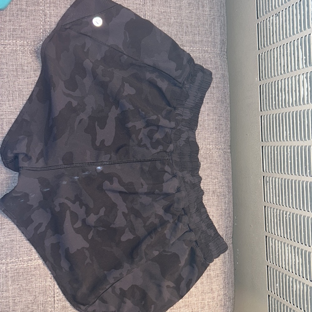 LULULEMON- black camo hotty hot shorts. Size 10- 2.5” inseam.